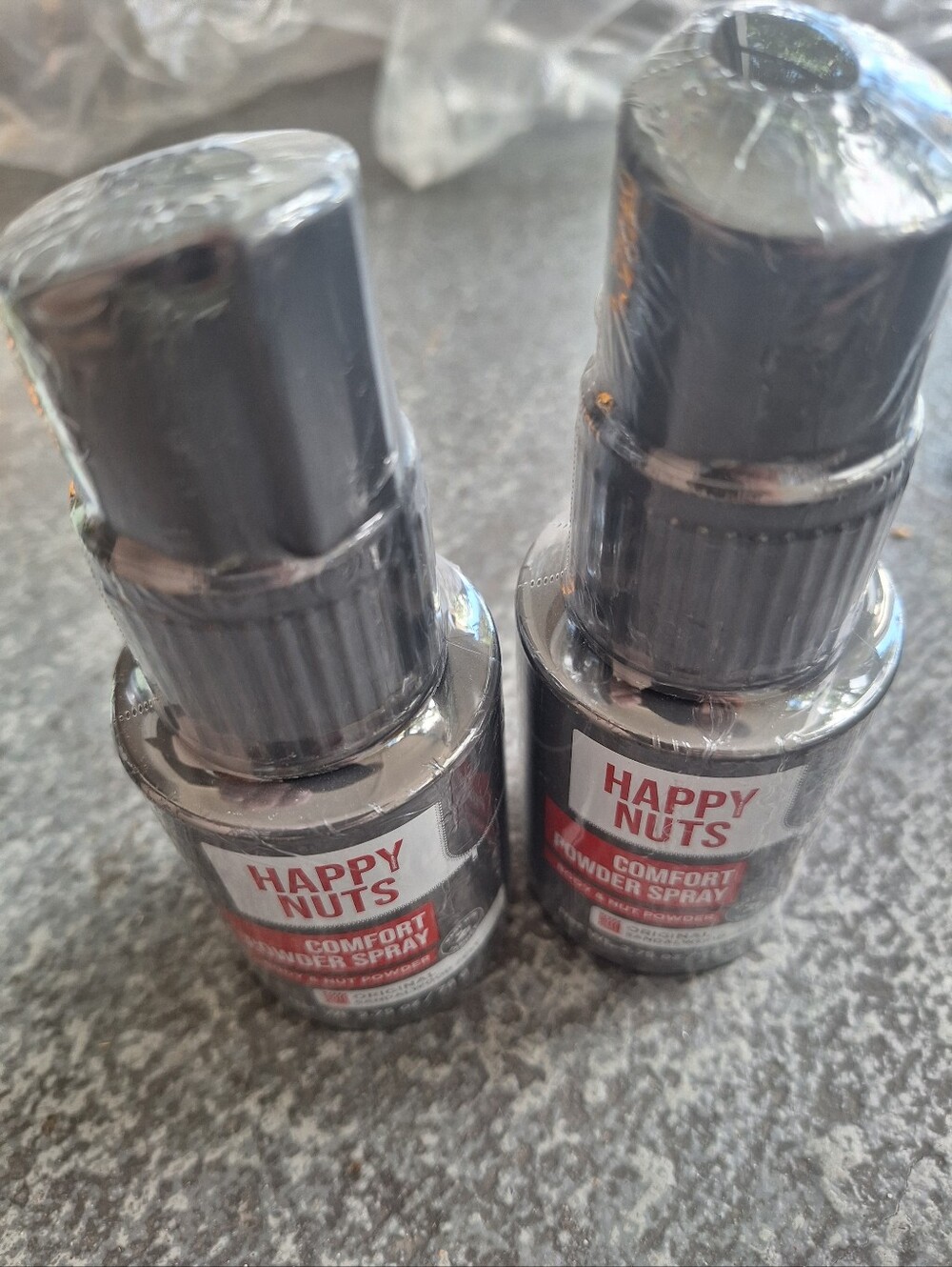 Pair Of Men Comfort Powder Spray.